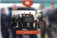 AMBER Alert in Indian Country Website Screenshot, September 2019 Amber Alert in Indian Country website screenshot. Includes site navigation and a picture of police officers.